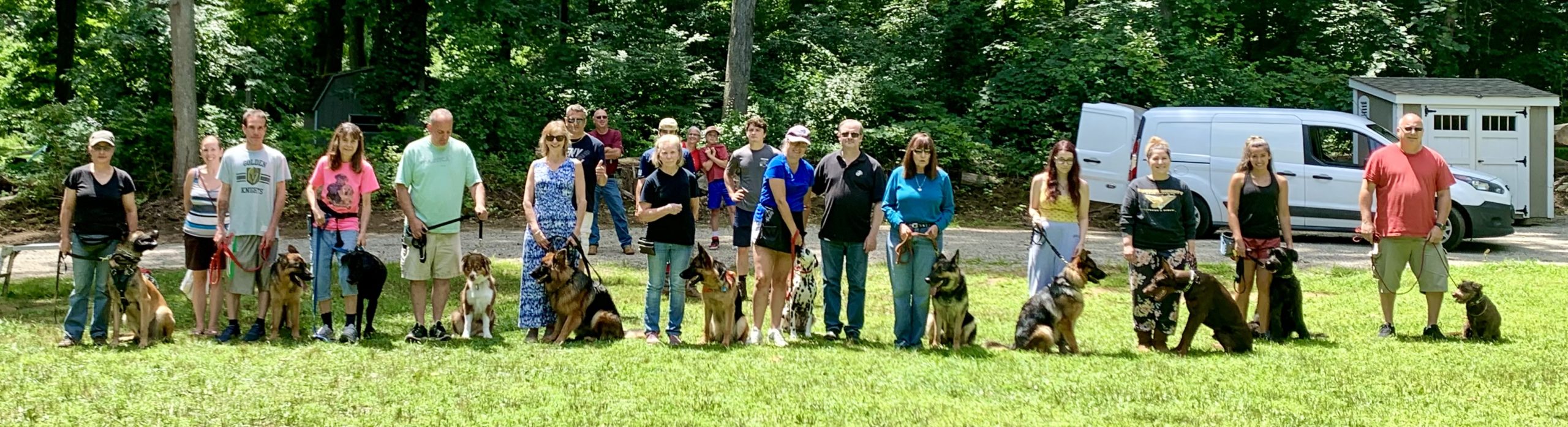 Owners and their dogs at a Metro K9 Academy training session, Bernardsville NJ